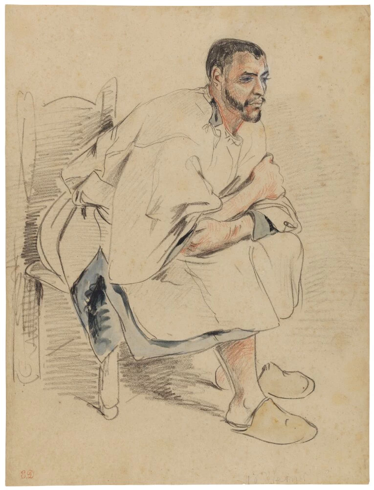 Uomo moresco seduto